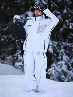 Back view of the white snowboard suit worn on a snowboard