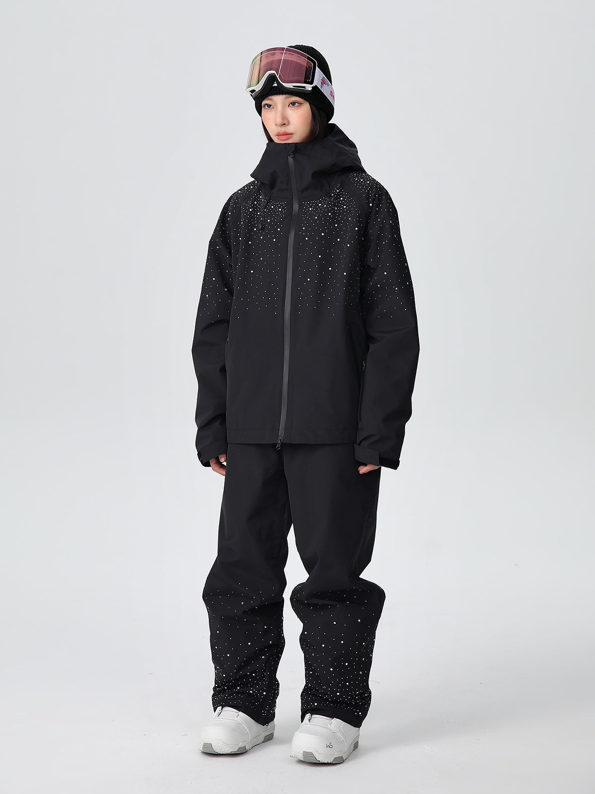 Front view of the women's glitter ski suit set with hood up