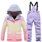 Kids rainbow ski jacket with purple snow bibs set