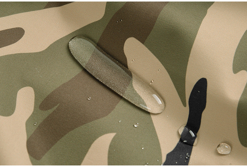 Water beading on the waterproof fabric of camo snow pants