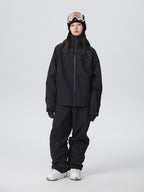 Front view of the fleece-lined glitter ski jacket and matching baggy snowboard pants