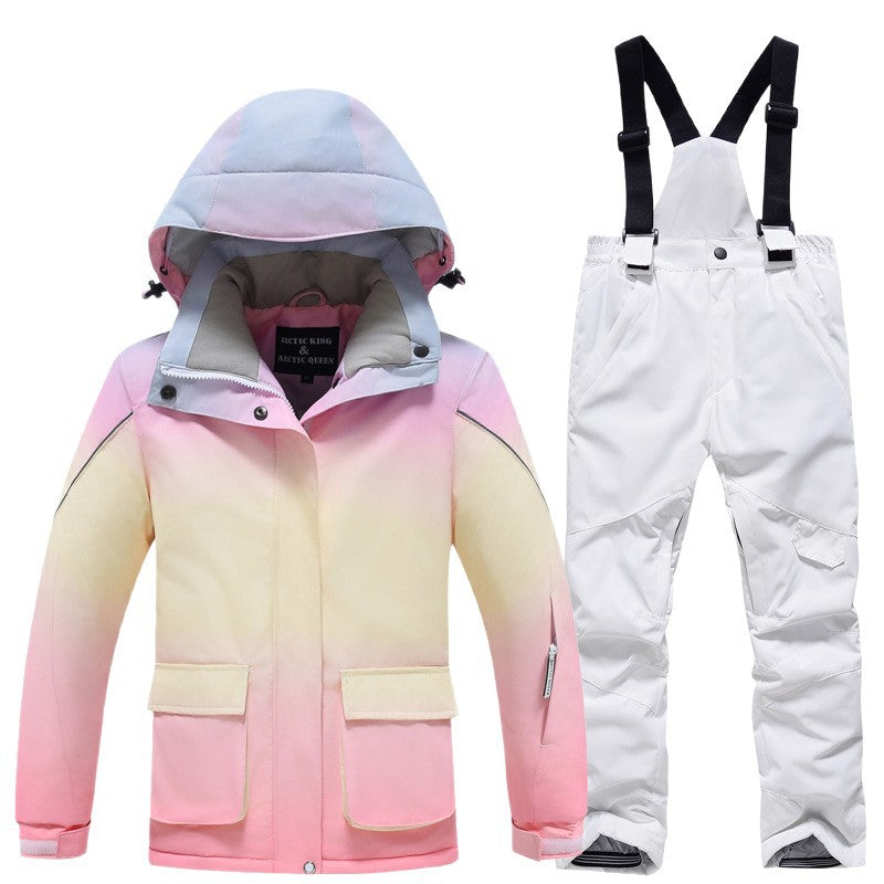 Kids rainbow ski jacket and white snow bibs two-piece set front view