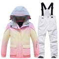 Kids rainbow ski jacket and white snow bibs two-piece set alternate view