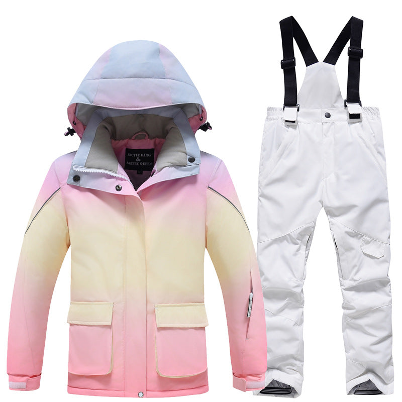 Kids rainbow ski jacket and white snow bibs two-piece set alternate view