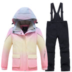 Kids rainbow ski jacket with black snow bibs set