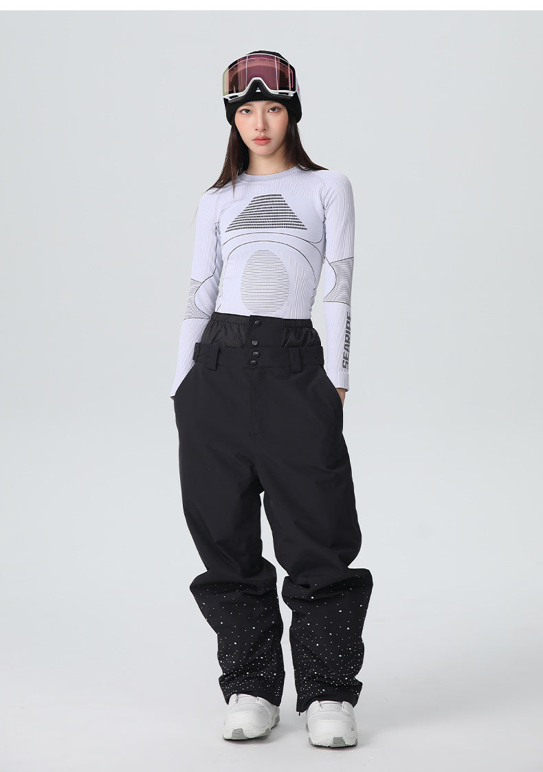 Detail of the baggy ski pants with adjustable side waist tabs