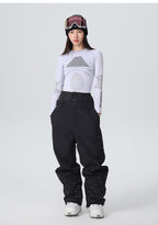 Detail of the baggy ski pants with adjustable side waist tabs