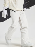 Men's Utility Snow Pants in White – Walking View with Snowboard