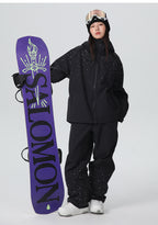 Black glitter women's ski suit set - sparkly jacket and baggy snow pants, front view