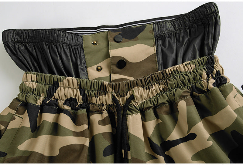 Elastic drawcord waistband with snap closure on camo snow pants