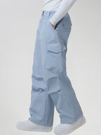 Men's Baggy Cargo Pocket Ski Pants in Light Blue - Side View Showing the Cargo Pocket