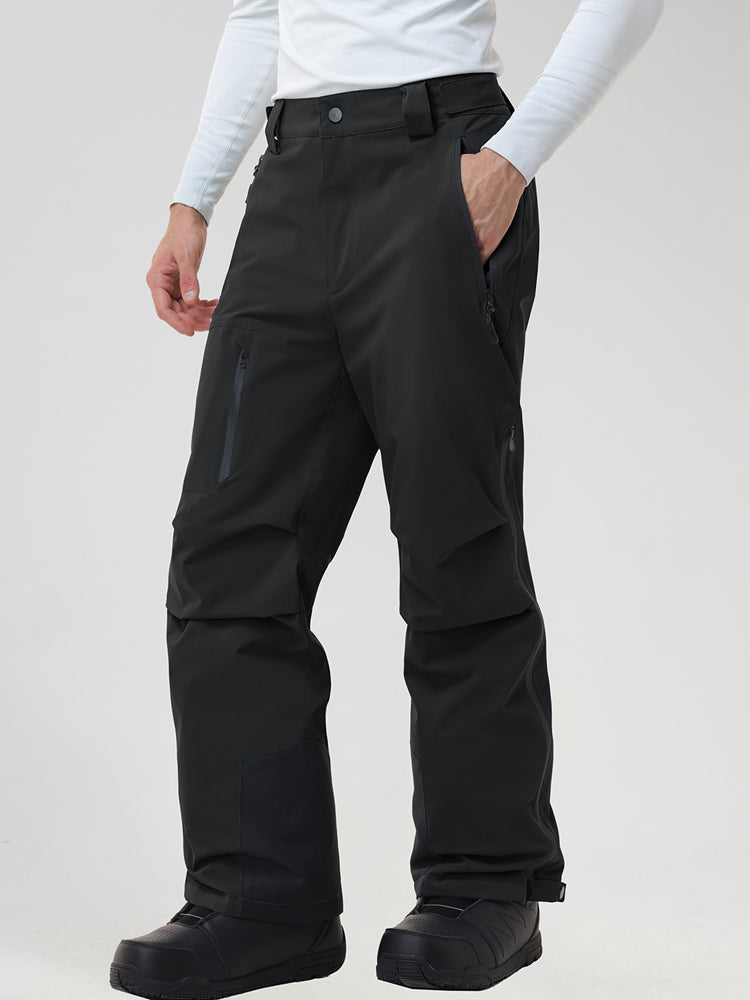 Men's insulated ski pants in Black - front view with a hand in the zip pocket