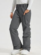 Men's Utility Snow Pants in Gray – Front View, Hand in Zippered Pocket
