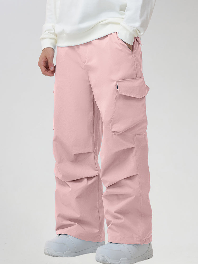 Men's Baggy Cargo Pocket Ski Pants in Pink - Three-Quarter View with Hand in Pocket