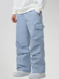 Men's Baggy Cargo Pocket Ski Pants in Light Blue - Three-Quarter View with Hand in Pocket