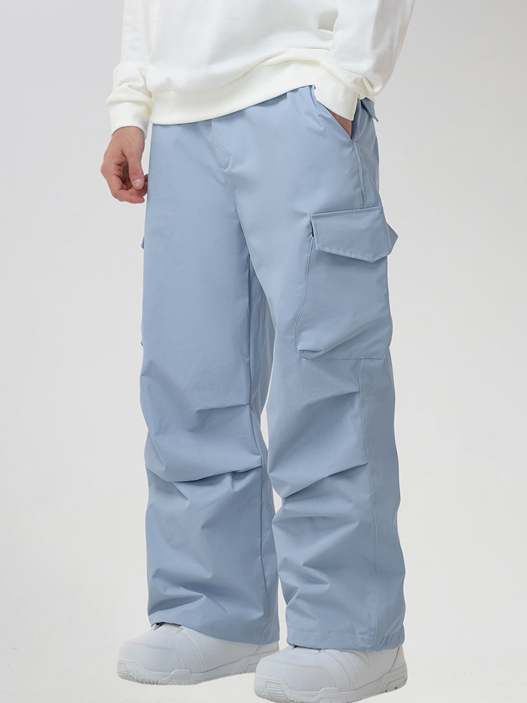 Men's Baggy Cargo Pocket Ski Pants in Light Blue - Three-Quarter View with Hand in Pocket