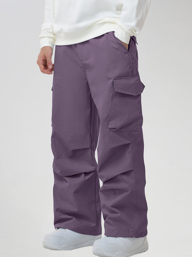 Men's Baggy Cargo Pocket Ski Pants in Purple - Three-Quarter View with Hand in Pocket
