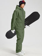 Men's army green 2-piece snowboard set holding a snowboard, three-quarter view