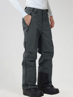 Men's insulated ski pants in Dark Grey - zip hand pocket in use