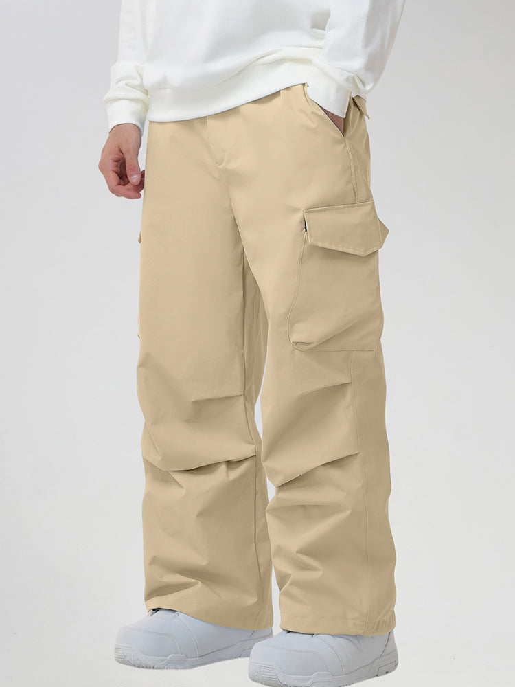 Men's Baggy Cargo Pocket Ski Pants in Khaki - Three-Quarter View with Hand in Pocket