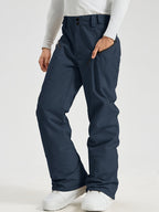 Men's Utility Snow Pants in Navy – Front View, Hand in Zippered Pocket