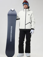 Front view of the men's casual ski jacket and snow pants set in beige, holding a snowboard