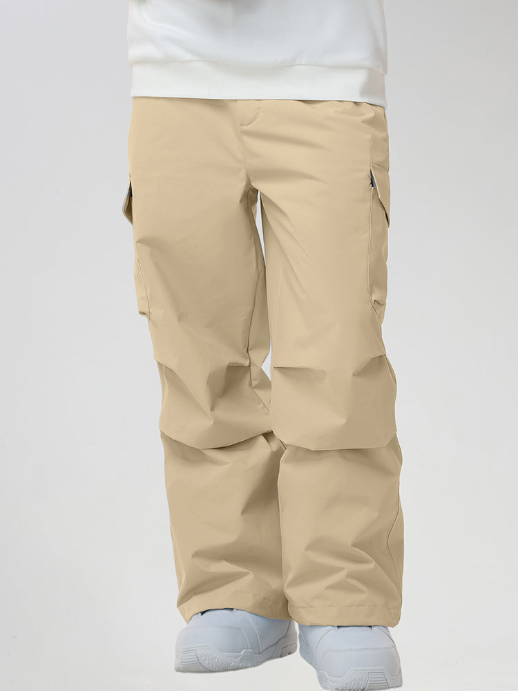 Men's Baggy Cargo Pocket Ski Pants in Khaki - Front View with Hands in Pockets