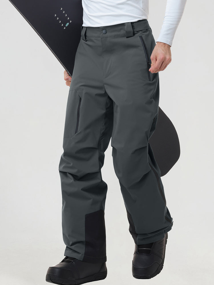 Men's insulated ski pants in Dark Grey worn with a snowboard