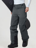 Men's insulated ski pants in Dark Grey worn with a snowboard