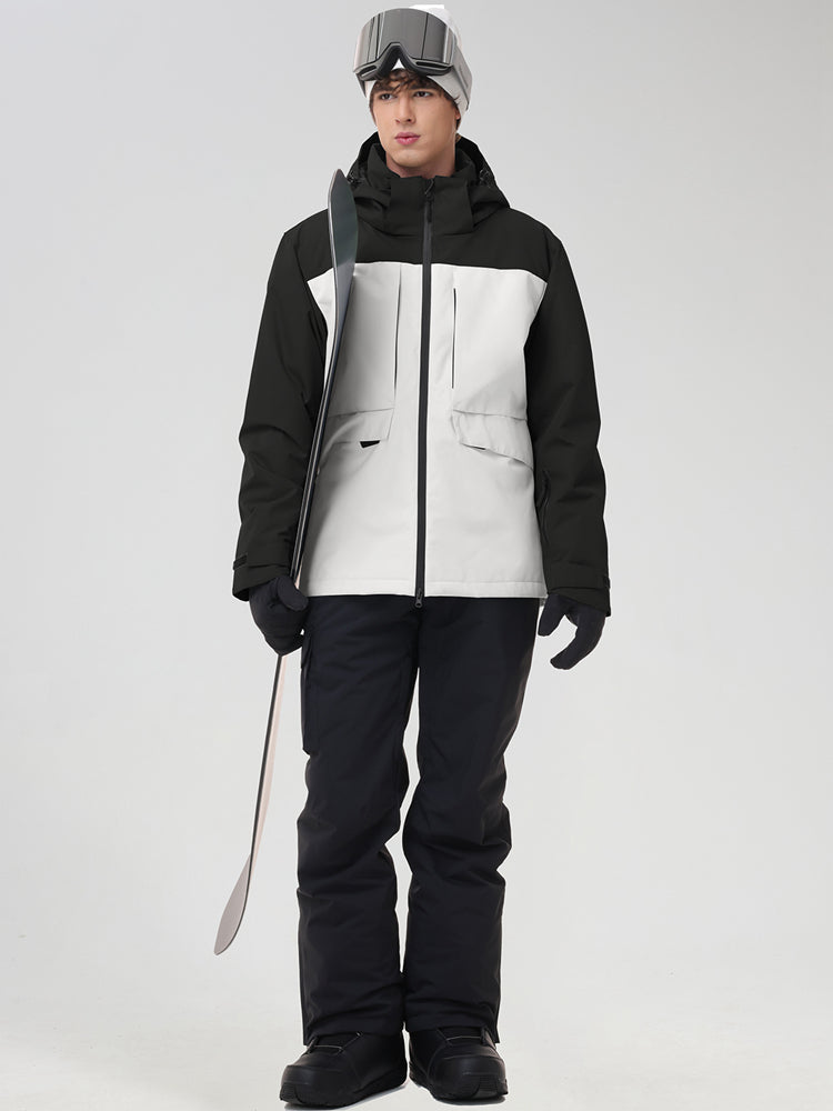 Men's black and white color-block ski jacket with black pants, holding ski poles