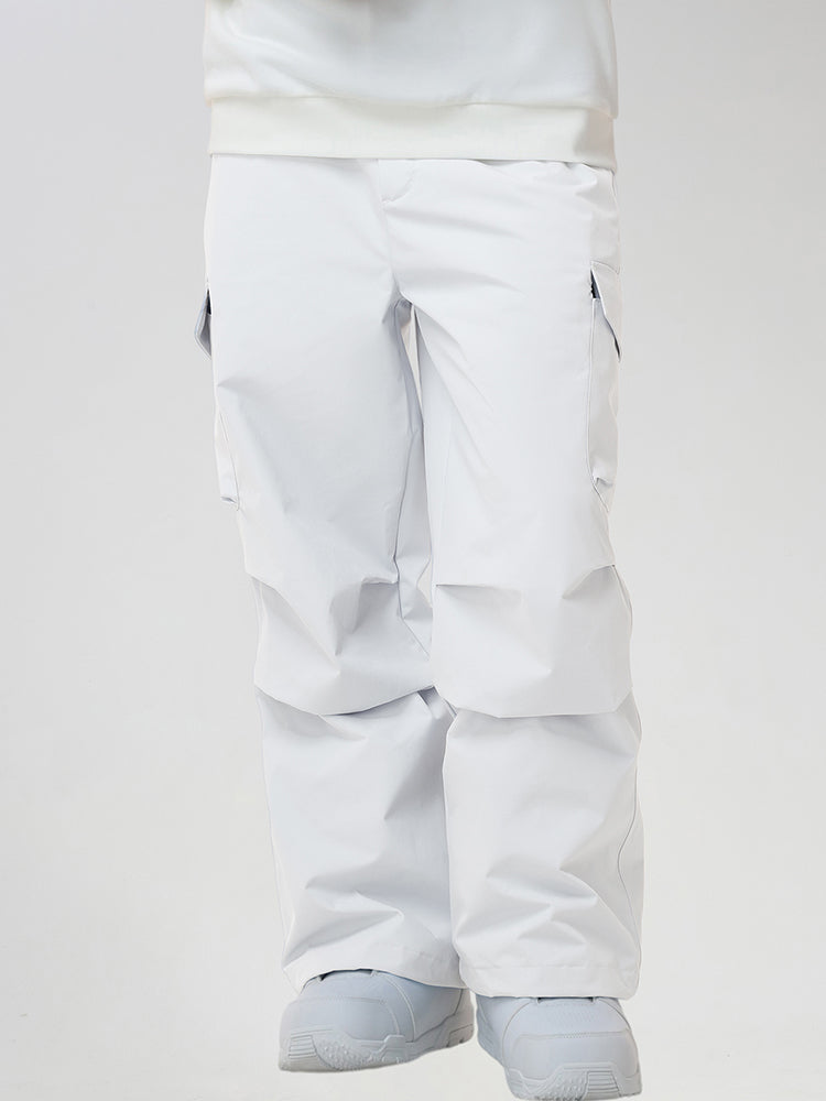 Men's Baggy Cargo Pocket Ski Pants in White - Front View with Hands in Pockets