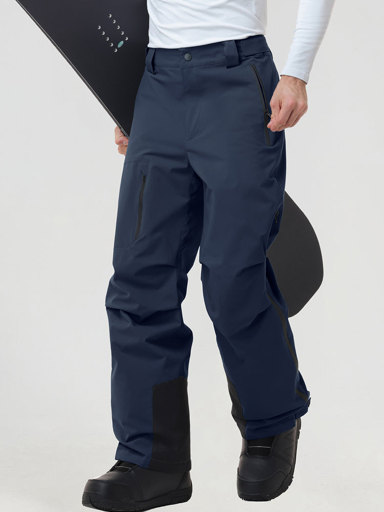 Men's insulated ski pants in Navy worn with a snowboard
