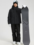 YEEFINE men's Black cargo jacket and ski pants, posing with a snowboard, front view
