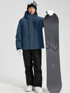YEEFINE men's Navy cargo jacket and ski pants, posing with a snowboard, front view