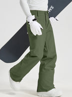 Men's Utility Snow Pants in Army Green – Walking View with Snowboard