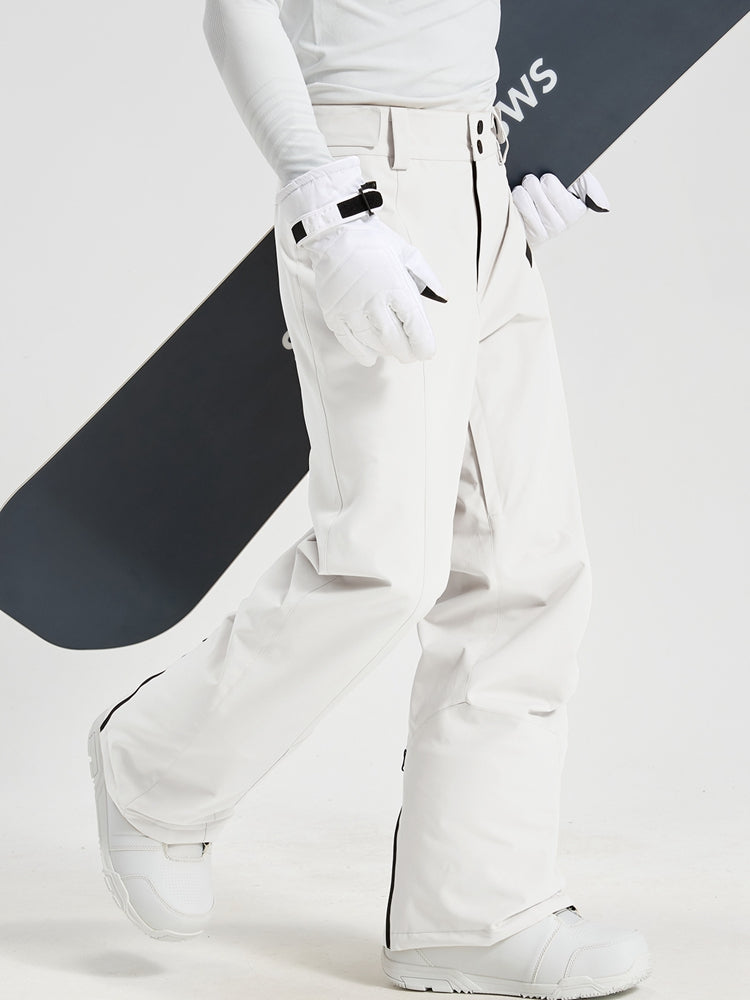 Men's Utility Snow Pants in White – Walking View with Snowboard