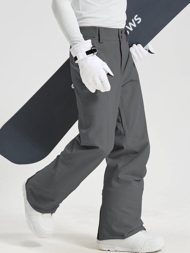 Men's Utility Snow Pants in Gray – Walking View with Snowboard