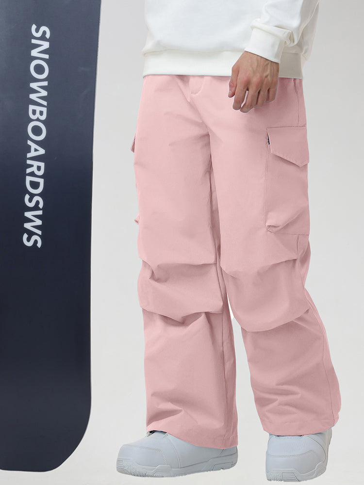 Men's Baggy Cargo Pocket Ski Pants in Pink - Model with Snowboard