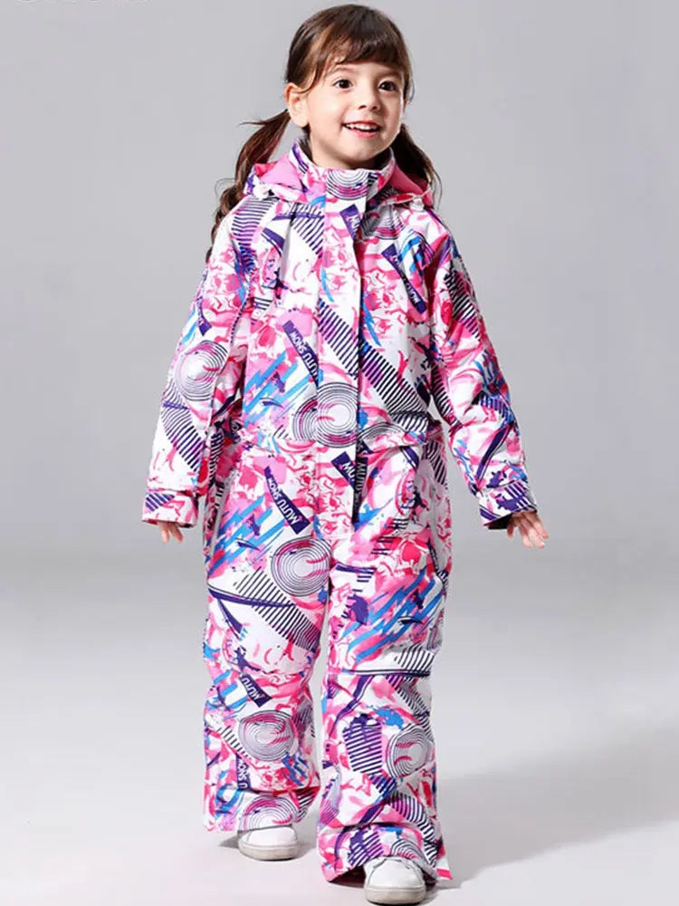Girl wearing colorful geometric print one-piece snowsuit