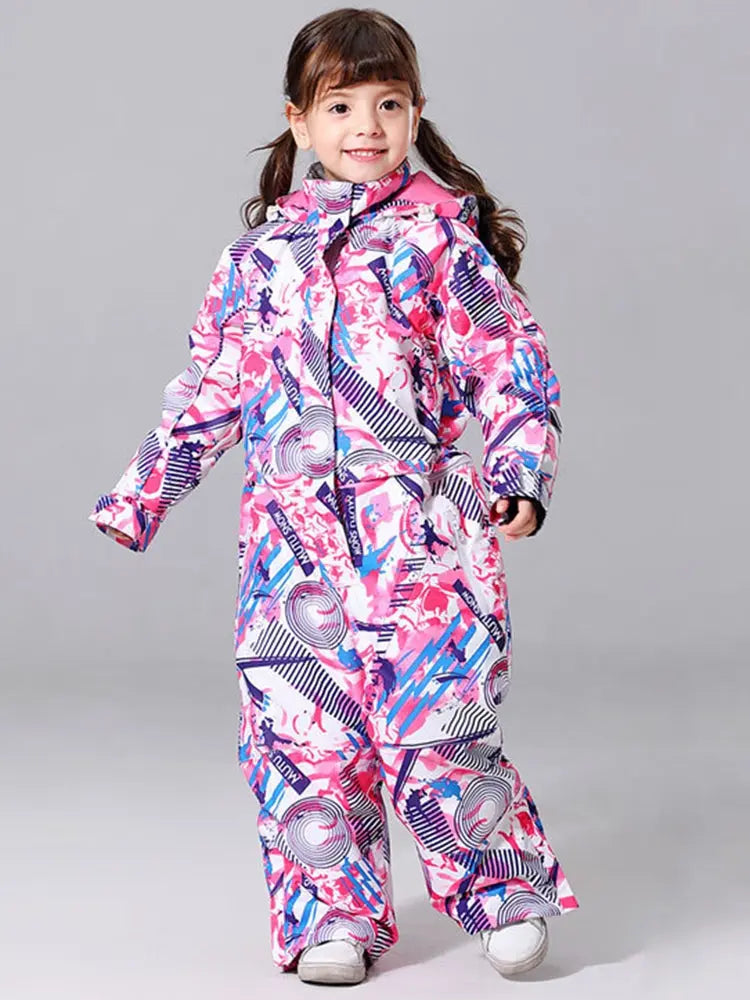 Girl wearing colorful geometric print one-piece snowsuit