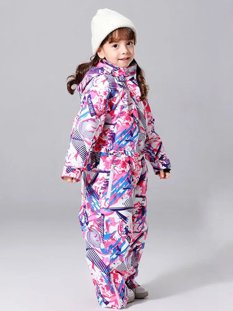 Girl wearing colorful geometric print one-piece snowsuit