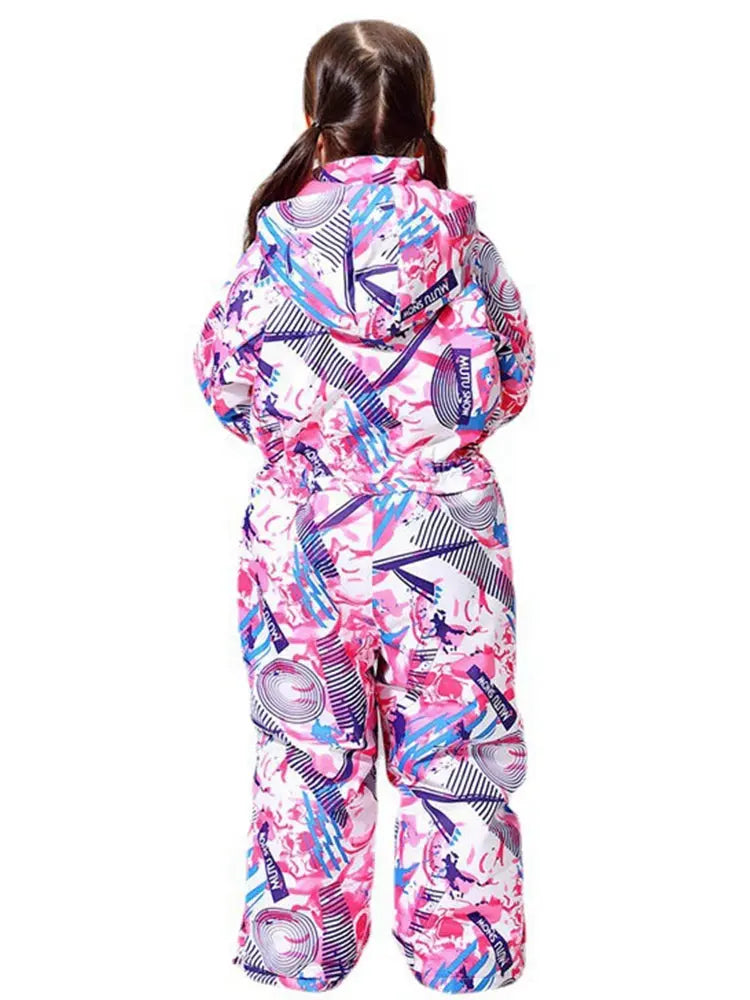 Girl wearing colorful geometric print one-piece snowsuit