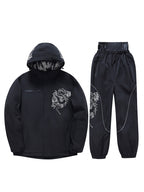 Black ski jacket and pants set flat lay