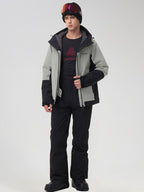 Men's light grey color-block ski jacket with black snow pants, front view
