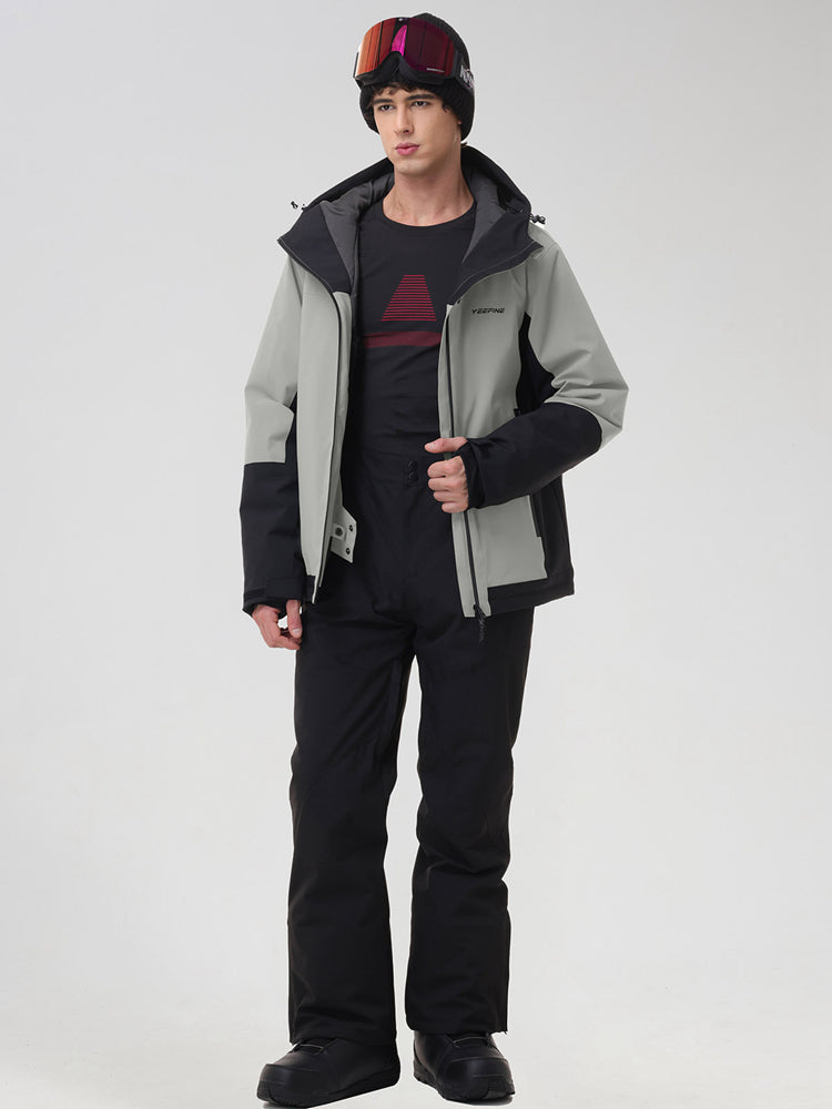 Men's light grey color-block ski jacket with black snow pants, front view