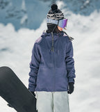 Women's 3-Layer Bonded Softshell Ski Jacket in Purple, worn on the slopes
